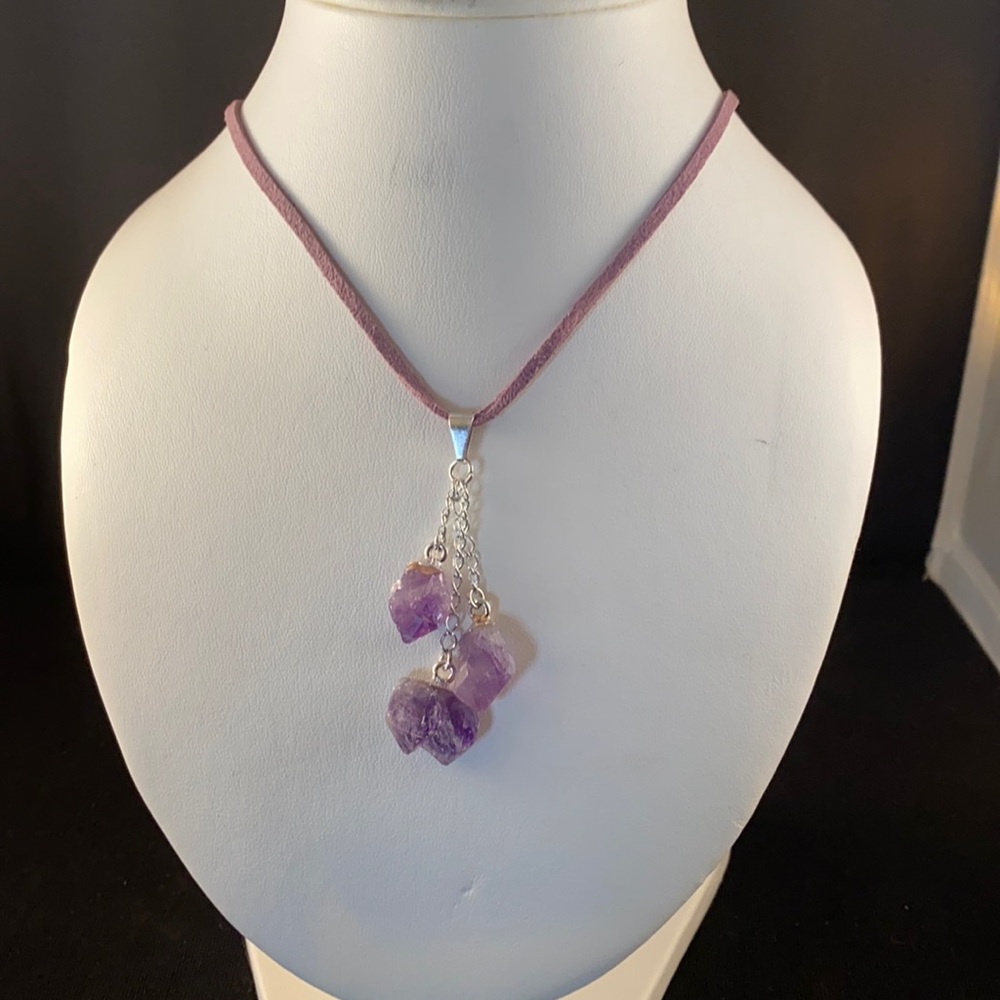 3 strand amethyst pendant on purple leather rope